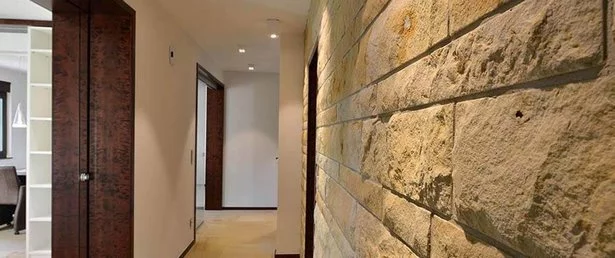 wohnzimmer-wand-steine-27_7-15 Nappali fal kövek